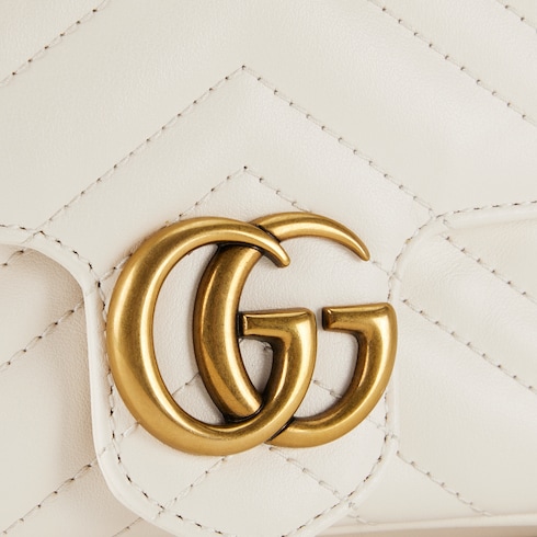 White gucci purse with best sale gold chain