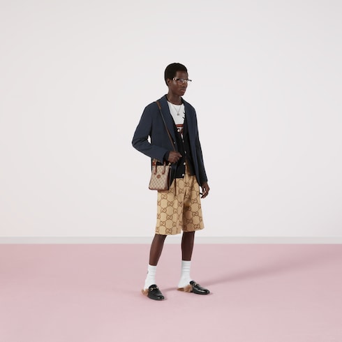 Short gucci precio deals