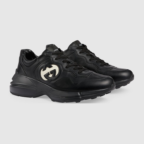 Men s Rhyton sneaker with Interlocking G in black leather GUCCI