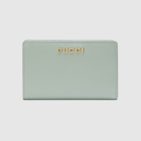 Zip around wallet with Gucci script in Green Leather | GUCCI® SI