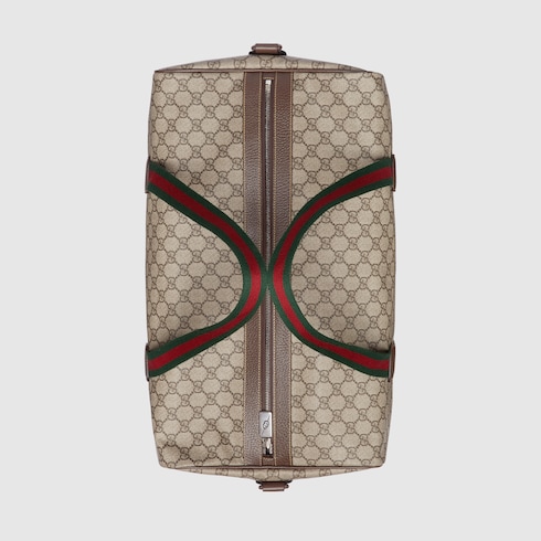 米色和乌木色柔软GG Supreme帆布饰织带中号旅行包| GUCCI® 香港