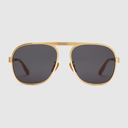 Navigator frame sunglasses in gold-toned metal | GUCCI® US