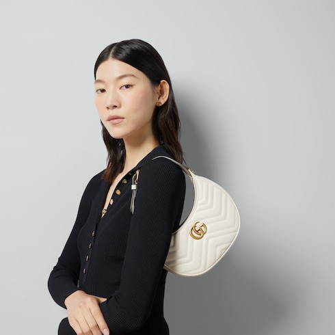 GG Marmont half-moon-shaped mini bag in white leather