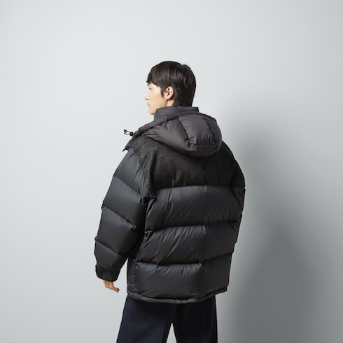 Nylon down jacket with GG inserts in black | GUCCI® US