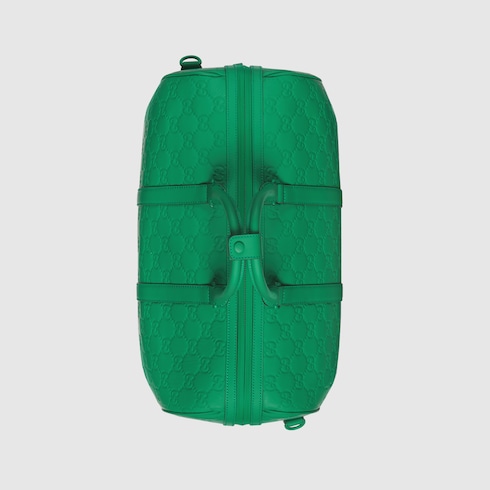 Sac de voyage GG effet caoutchouc de taille moyenne en cuir vert GUCCI FR