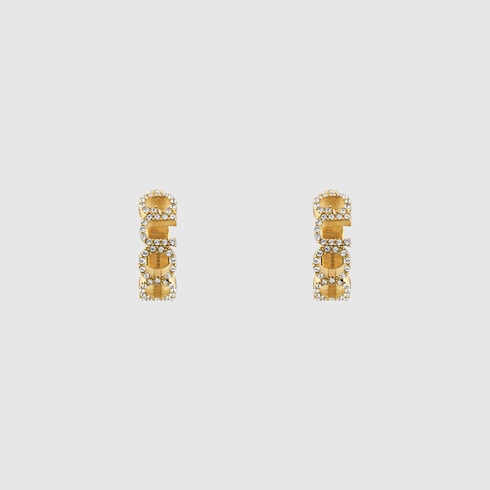 Créoles avec inscription « GUCCI »