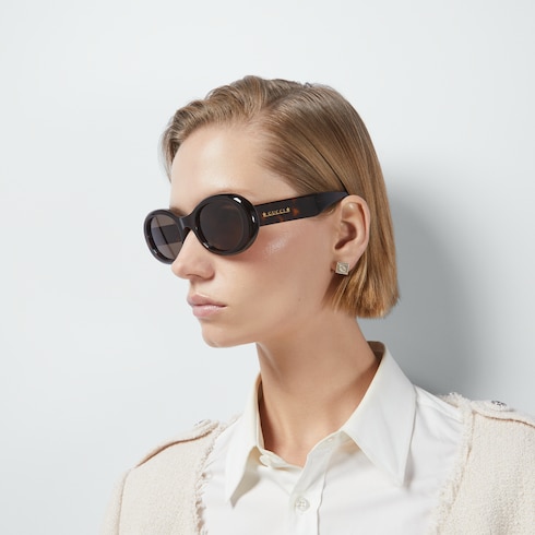Gafas de sol con forma ovalada en acetato carey GUCCI ES