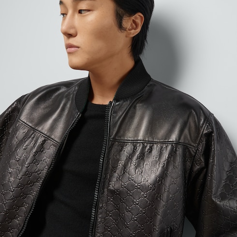 GG embossed leather bomber jacket in black | GUCCI® GR