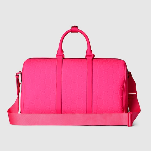 GG rubber effect medium duffle bag in fuchsia leather GUCCI US