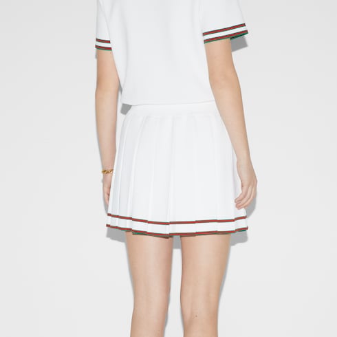 Short pleated skirt with striped trim
