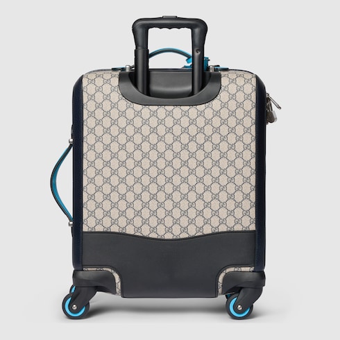 Valise a roulettes Gucci Savoy taille cabine en toile GG Supreme coloris beige et bleu GUCCI FR