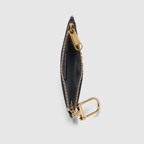 Étui à clés zippé avec inscription Gucci