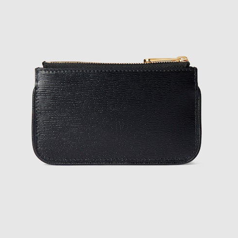 Étui à clés zippé avec inscription Gucci