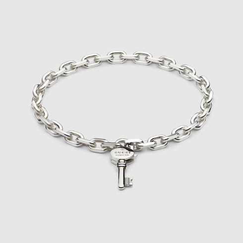 Trademark chain bracelet with key