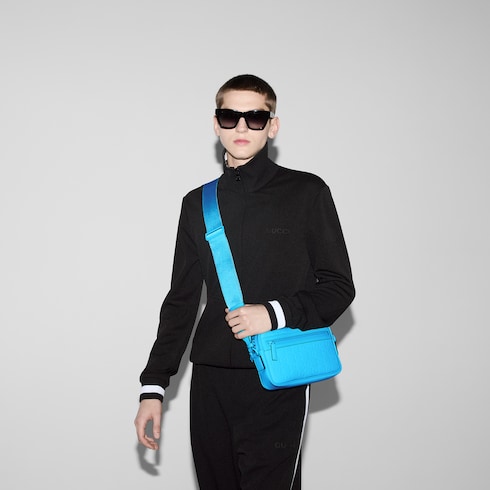 GG rubber effect crossbody bag in bright blue leather GUCCI MX