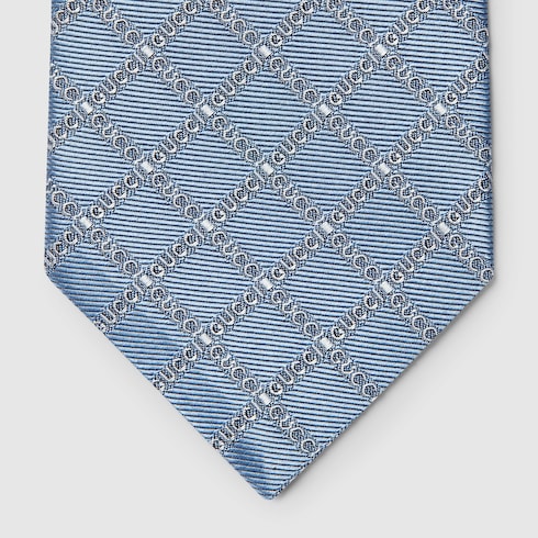 Vintage Gucci 100% silk selling light blue geometric print tie made in Italy