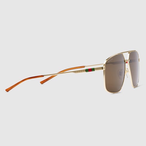 Navigator frame sunglasses in gold GUCCI Canada