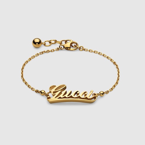 Bracciale a catena con scritta Gucci