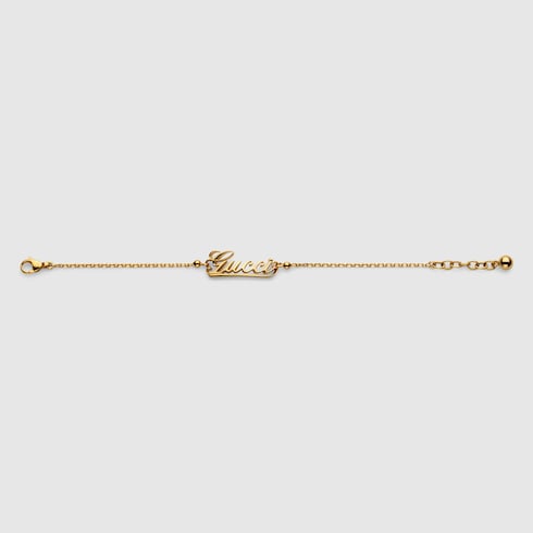 Bracciale a catena con scritta Gucci