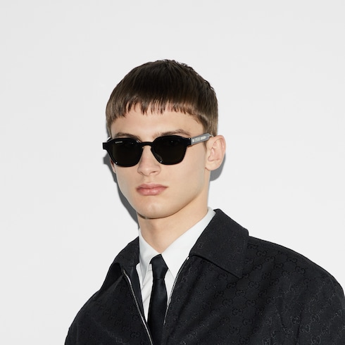 Oval frame sunglasses in black | GUCCI® US