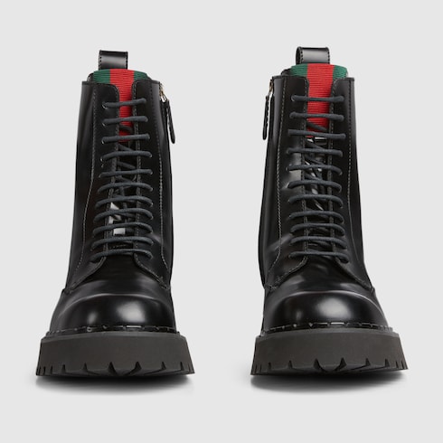 Stivale uomo con dettaglio Web in pelle nera GUCCI Italia