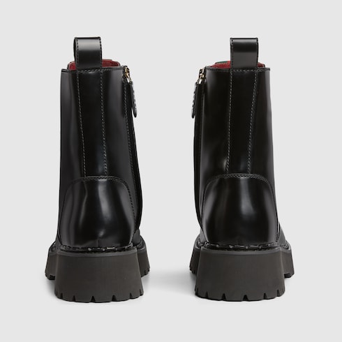 Stivale uomo con dettaglio Web in pelle nera GUCCI Italia