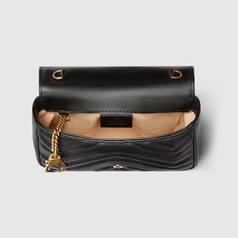Mini borsa GG Marmont in pelle nera con motivo chevron matelasse GUCCI Italia