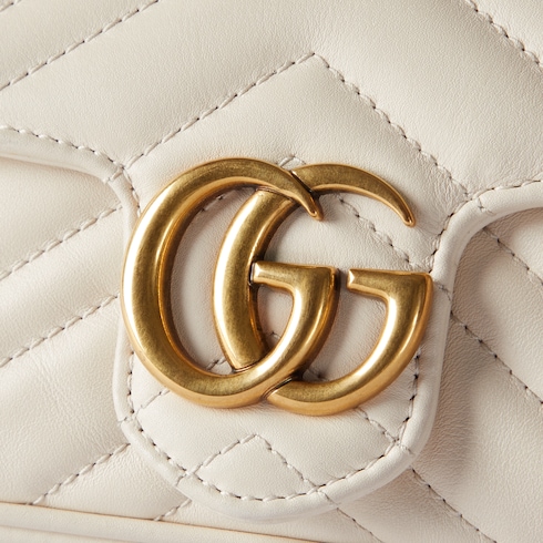 Mini borsa GG Marmont in pelle bianca con motivo chevron matelasse GUCCI Italia