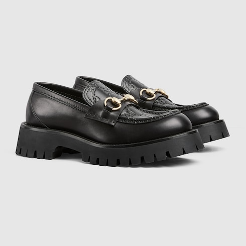 Women s Horsebit loafer with lug sole in Black Leather GUCCI SI