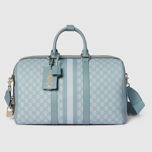 Ophidia medium duffle bag in dusty blue GG Supreme GUCCI US