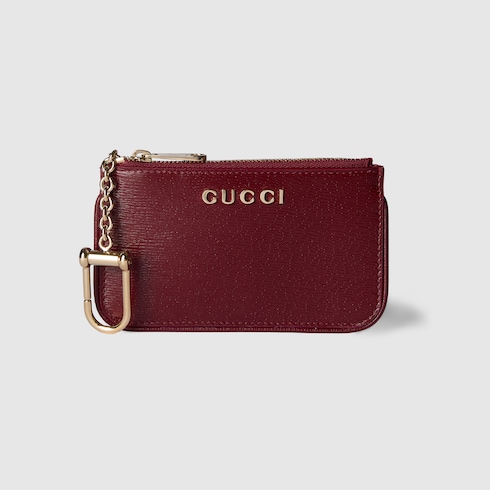 Zip key pouch with Gucci script