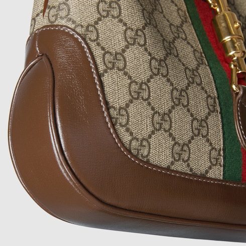 Маленькая сумка на плечо Jackie 1961 inтекстиль GG Supreme | GUCCI®  International