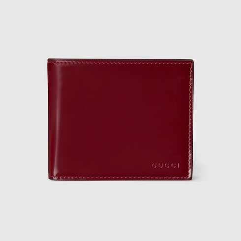 Bi-fold embossed wallet in Rosso Ancora red leather | GUCCI® TH