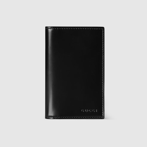 Bi-fold embossed card case