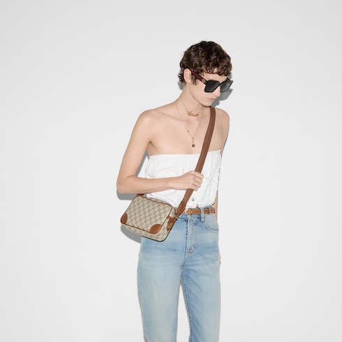 GG Emblem embossed super mini bag in Beige GG Canvas | GUCCI® SI GG Emblem embossed super mini bag in Beige GG Canvas | GUCCI® SI