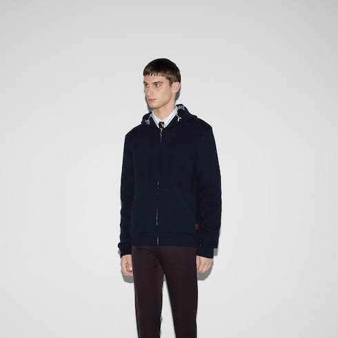 Veste zippée à capuche réversible en laine GG