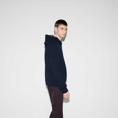 Veste zippée à capuche réversible en laine GG