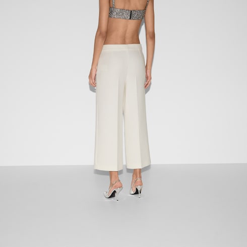 Pantalon en laine bouclée avec broderie