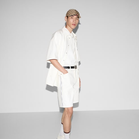 Shorts in denim con dettaglio Gucci cimosa