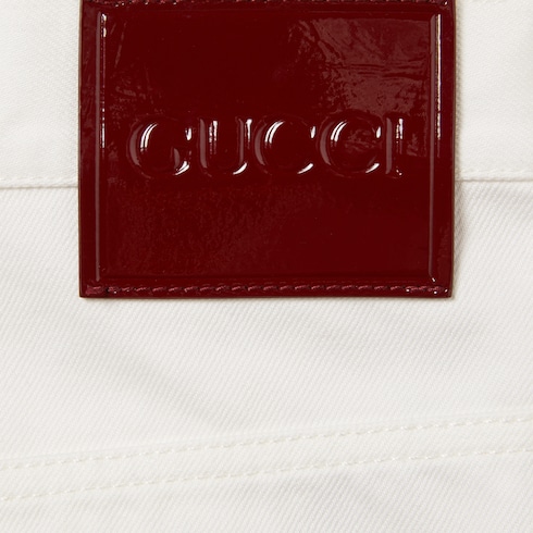 Short en denim avec lisière Gucci