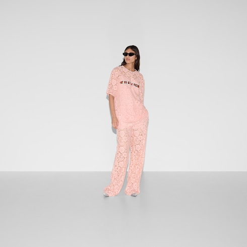Floral lace trousers with Gucci script
