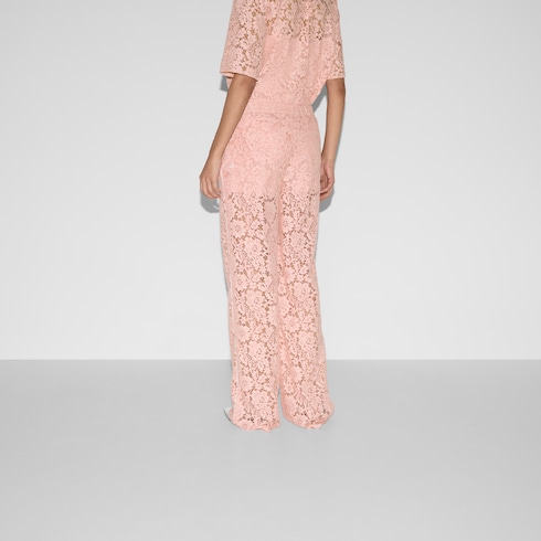 Floral lace trousers with Gucci script