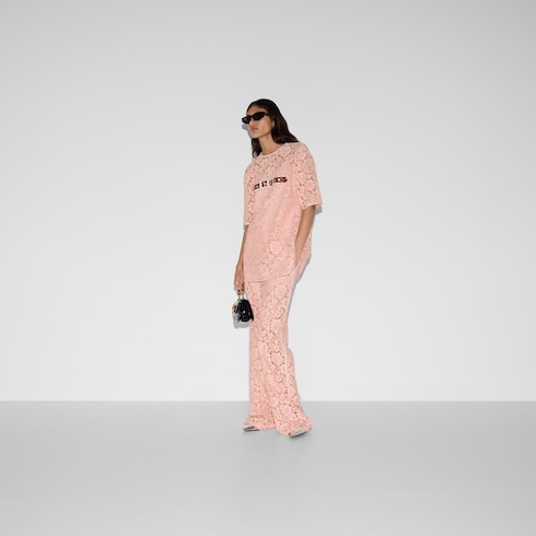 Floral lace trousers with Gucci script