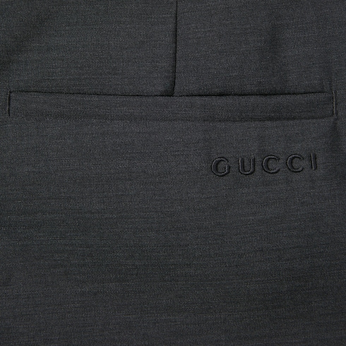 Pantaloni oversize a vita bassa in lana