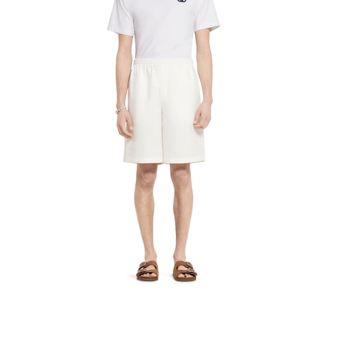 Linen shorts with embossed logo