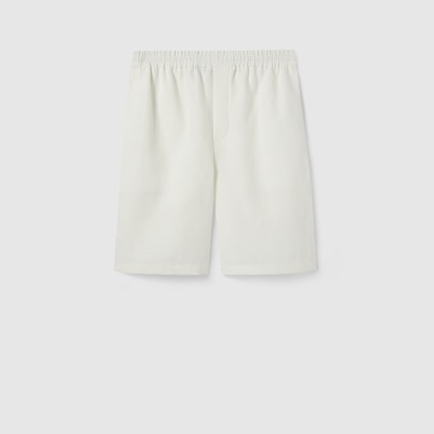 Linen shorts with embossed logo