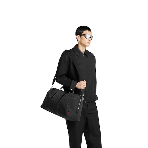 Sac de voyage en toile GG moyen format 