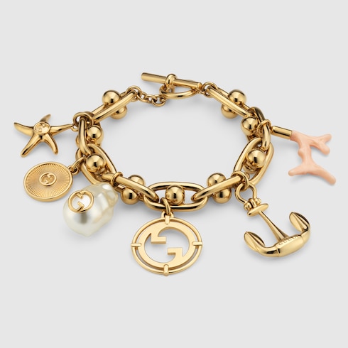 Bracelet chaîne avec symboles Gucci