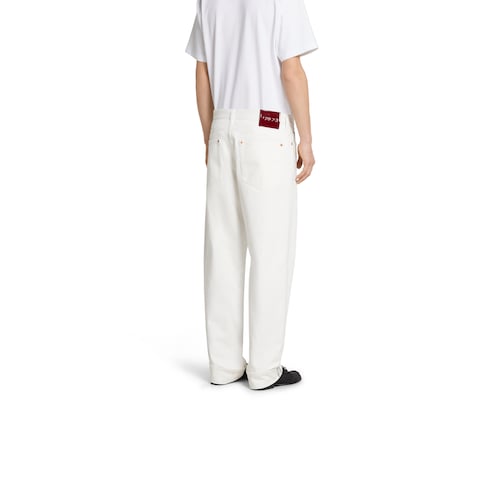 Pantalon en denim à lisière en coton