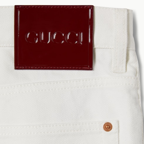 Pantalon en denim à lisière en coton